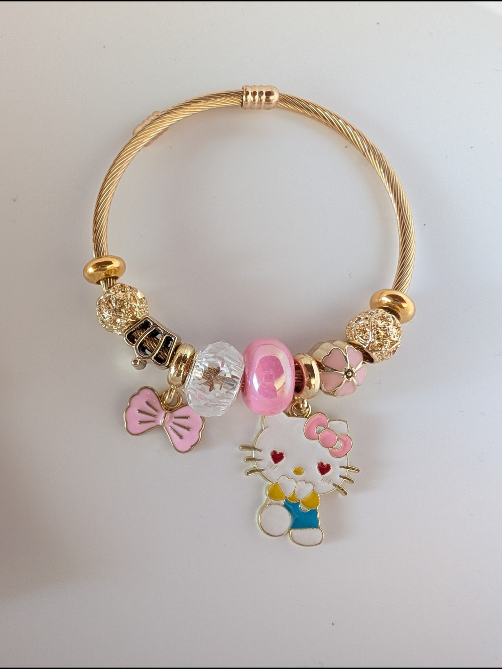 Gold Bracelet with Pink Hello Kitty Charm